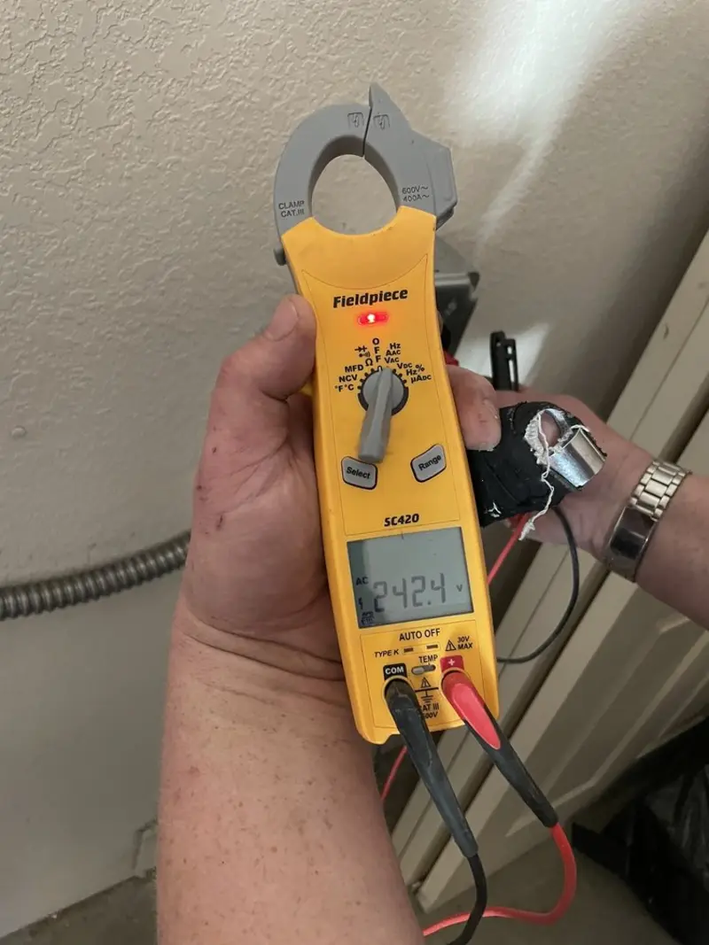 Voltage testing with clamp meter during Electrical Installation Services in Pleasant Hill